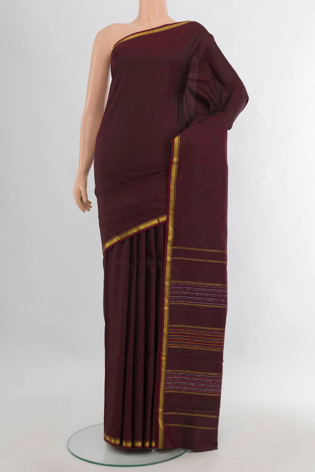Pure Silk Coffee Brown Kanchipuram Saree with Plain Body and Zari Border.  displayed on a mannequin