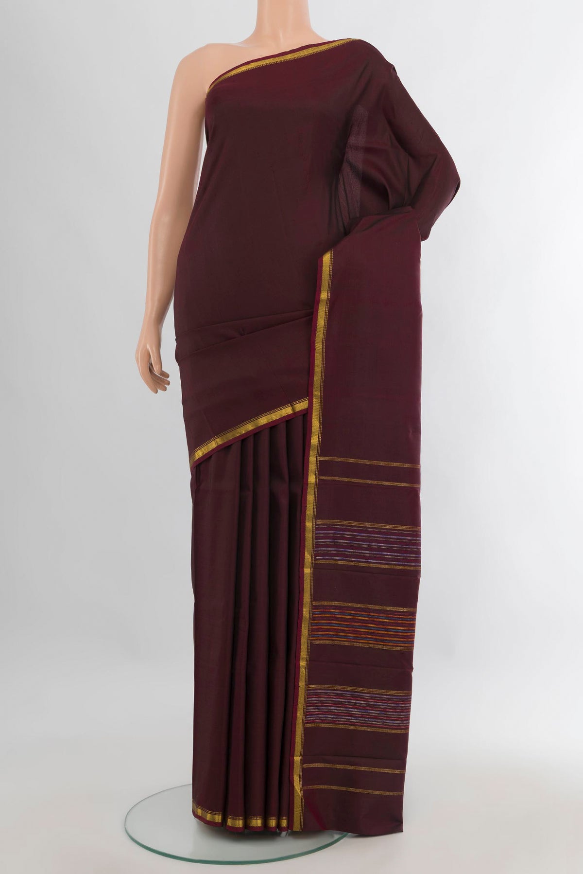 Pure Silk Coffee Brown Kanchipuram Saree with Plain Body and Zari Border.  displayed on a mannequin