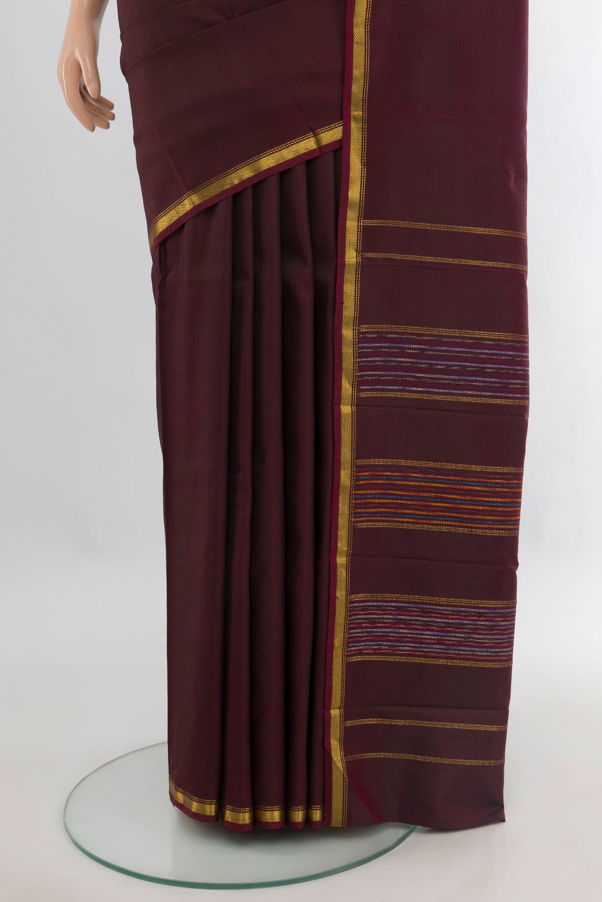 Pleats and pallu of Pure Silk Coffee Brown Kanchipuram Saree with Plain Body and Zari Border. 
