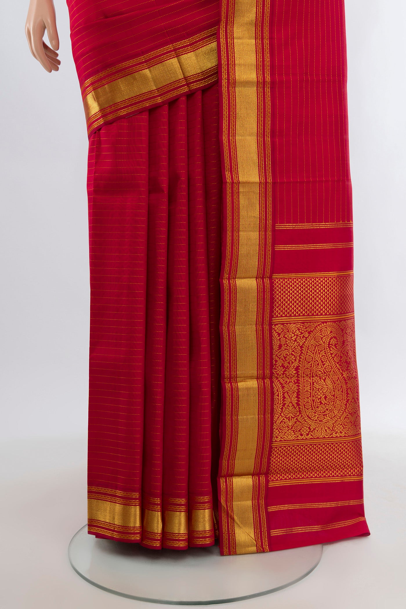 Pleats and pallu of Deep Red Kanjivaram Silk Saree with Stripes on the body and Zari Border. 
