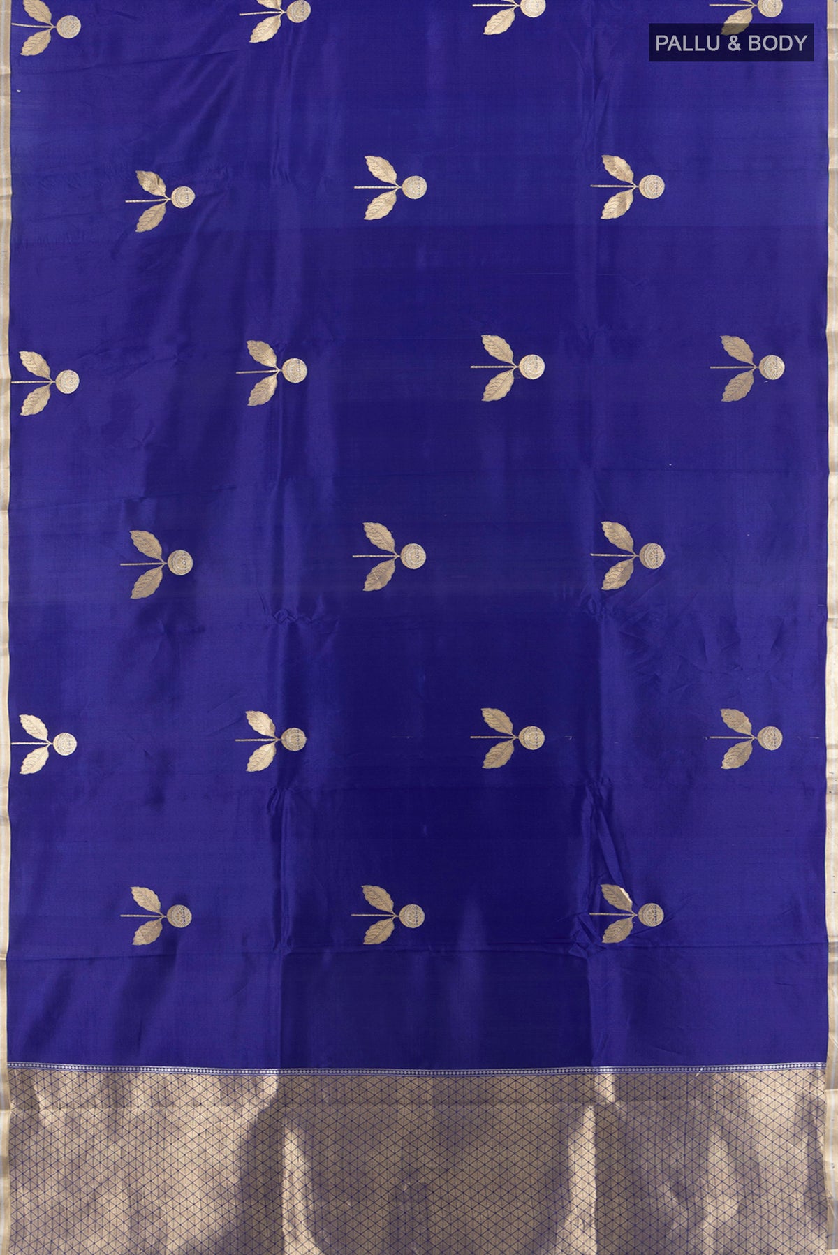 Flat view of Navy Blue Banarasi Katan Silk Saree with Zari Butta on the body and Silk Border. 