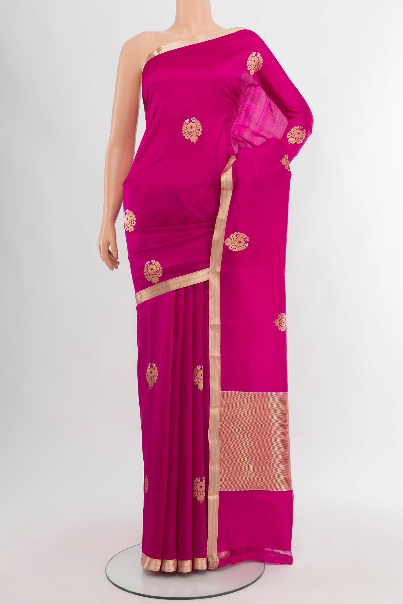 Dark Pink Banarasi Silk Saree with Zari Butta on the body and Zari Border.  displayed on a mannequin