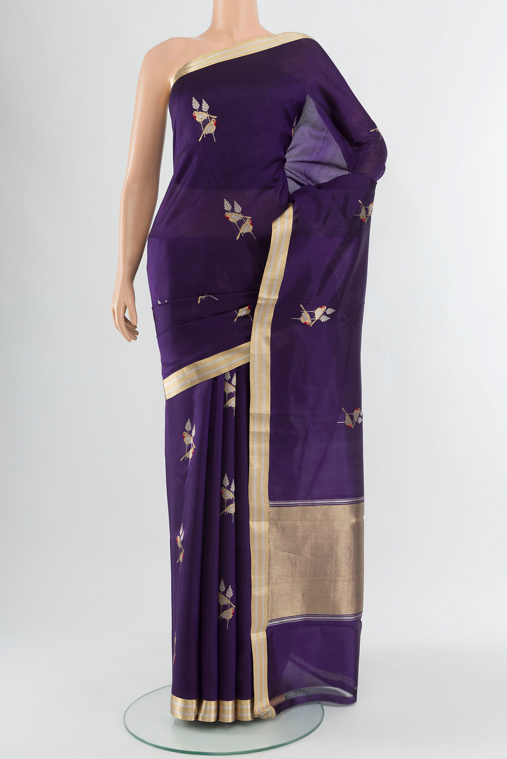 Navy Blue Banarasi Katan Silk Saree with Zari Butta on the body and Zari Border.  displayed on a mannequin