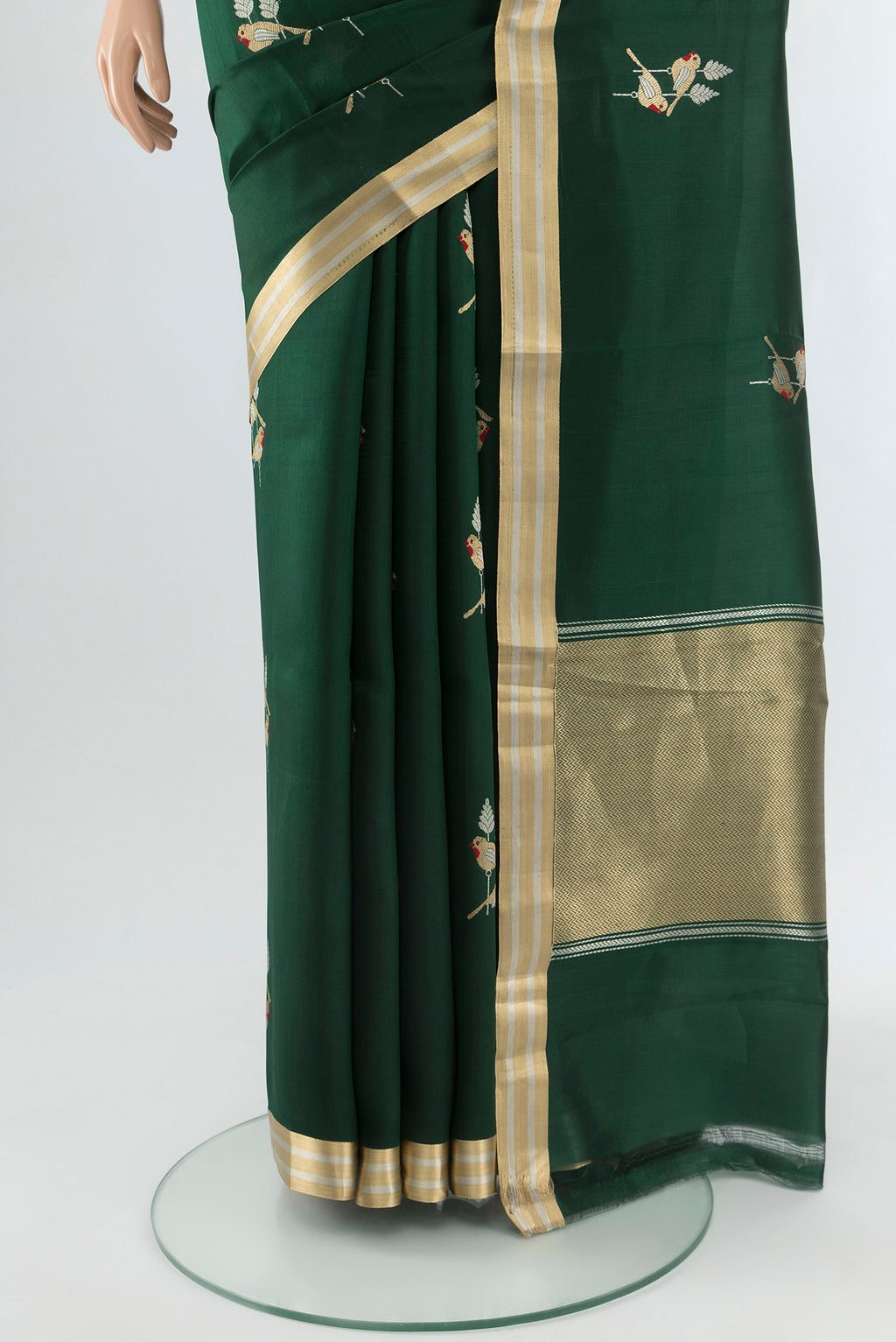 Pleats and pallu of Bottle Green Banarasi Silk Saree with Zari Butta on the body and Zari Border. 