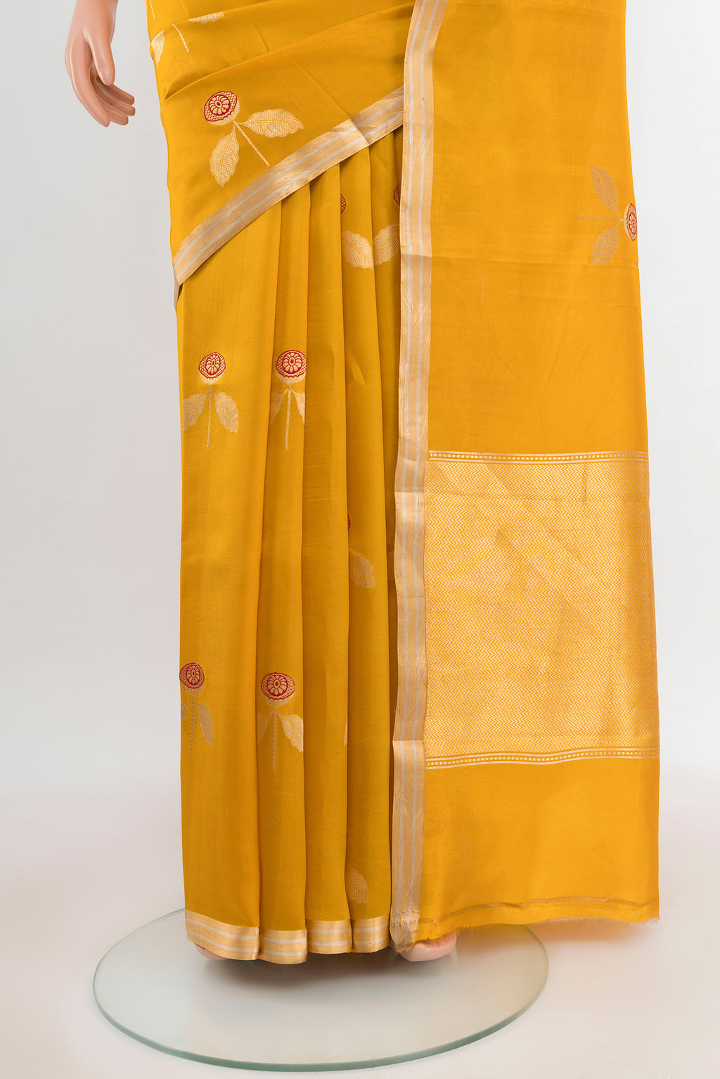 Pleats and pallu of Mustard Banarasi Katan Silk Saree with Zari Butta on the body and Silk Border. 