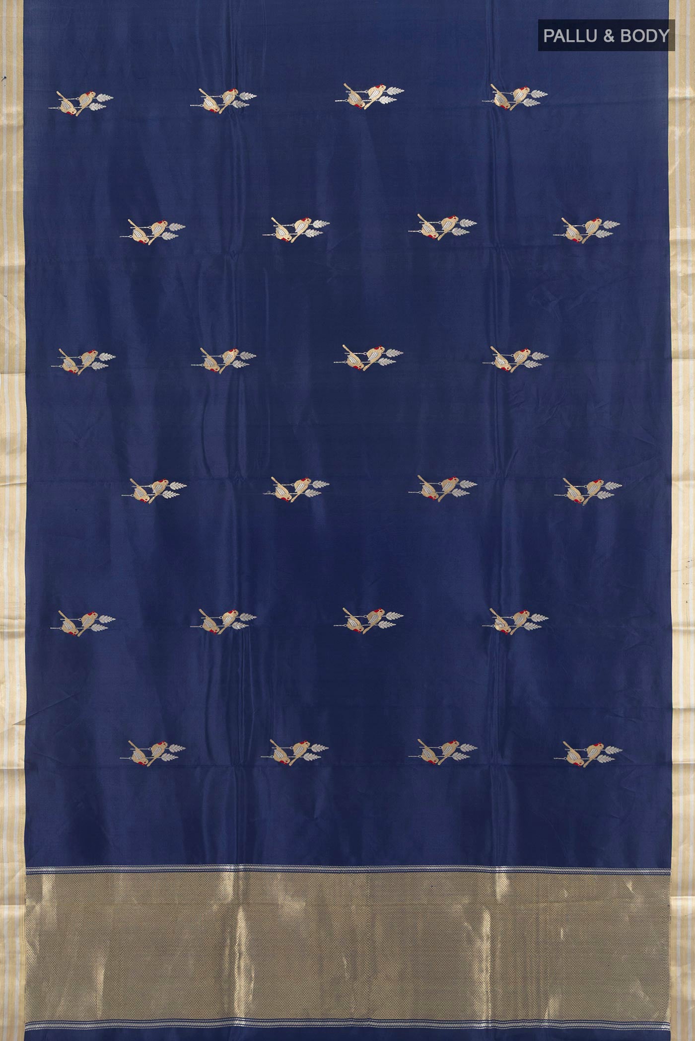 Flat view of Navy Blue Banarasi Katan Silk Saree with Zari Butta on the body and Silk Border. 
