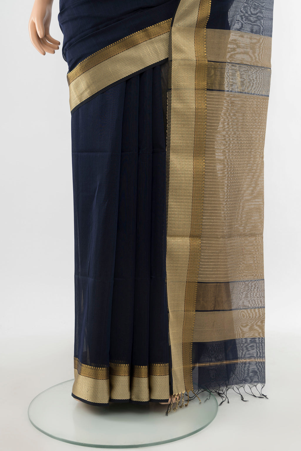Pleats and pallu of Navy Blue Maheshwari Silk Cotton Saree with Plain Body and Silk Border. 