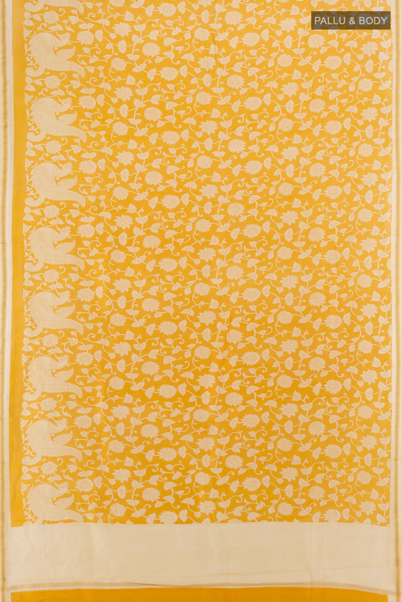 Flat view of Yellow Maheshwari Silk Cotton Saree with Floral Print on the body and Zari Border. 