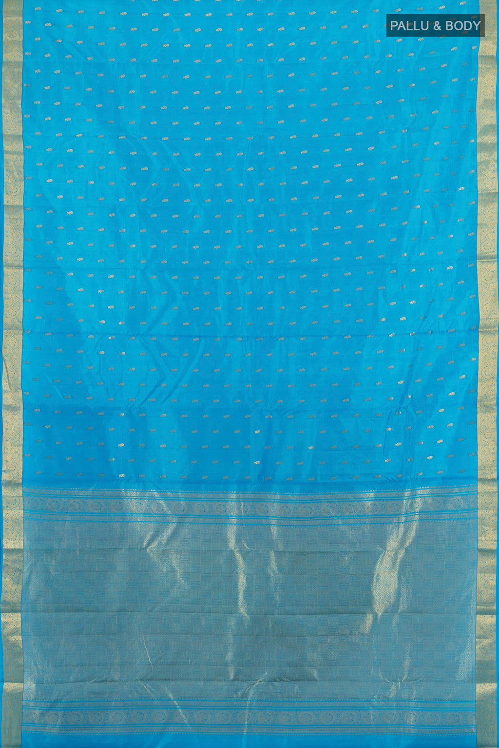 Flat view of Pure Silk Light Blue Kanchipuram Saree with Zari Butta on the body and Zari Border. 