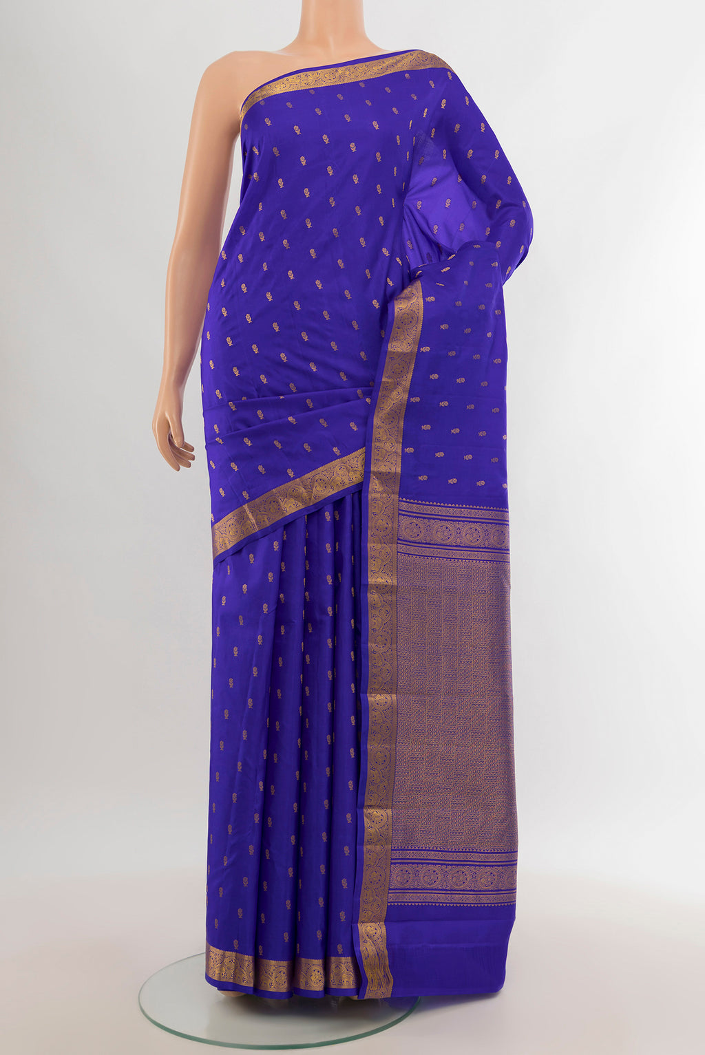 Royal Blue Kanchipuram Silk Saree with Zari Butta on the body and Zari Border.  displayed on a mannequin