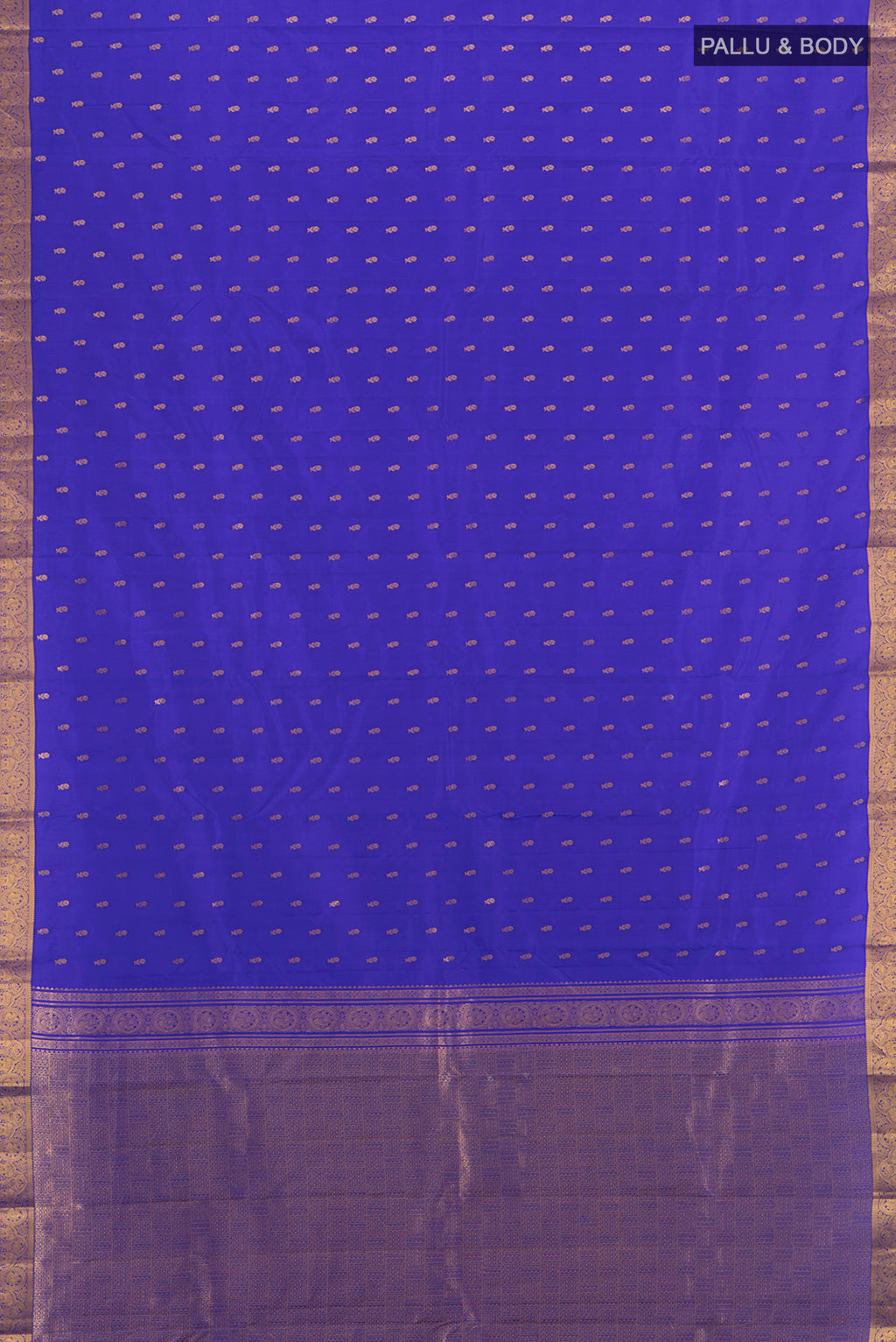 Flat view of Royal Blue Kanchipuram Silk Saree with Zari Butta on the body and Zari Border. 