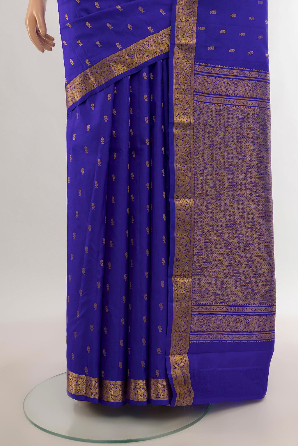 Pleats and pallu of Royal Blue Kanchipuram Silk Saree with Zari Butta on the body and Zari Border. 