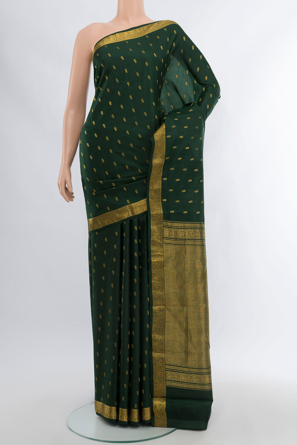 Mint Green Kanchipuram Silk Saree with Zari Butta on the body and Silk Border.  displayed on a mannequin