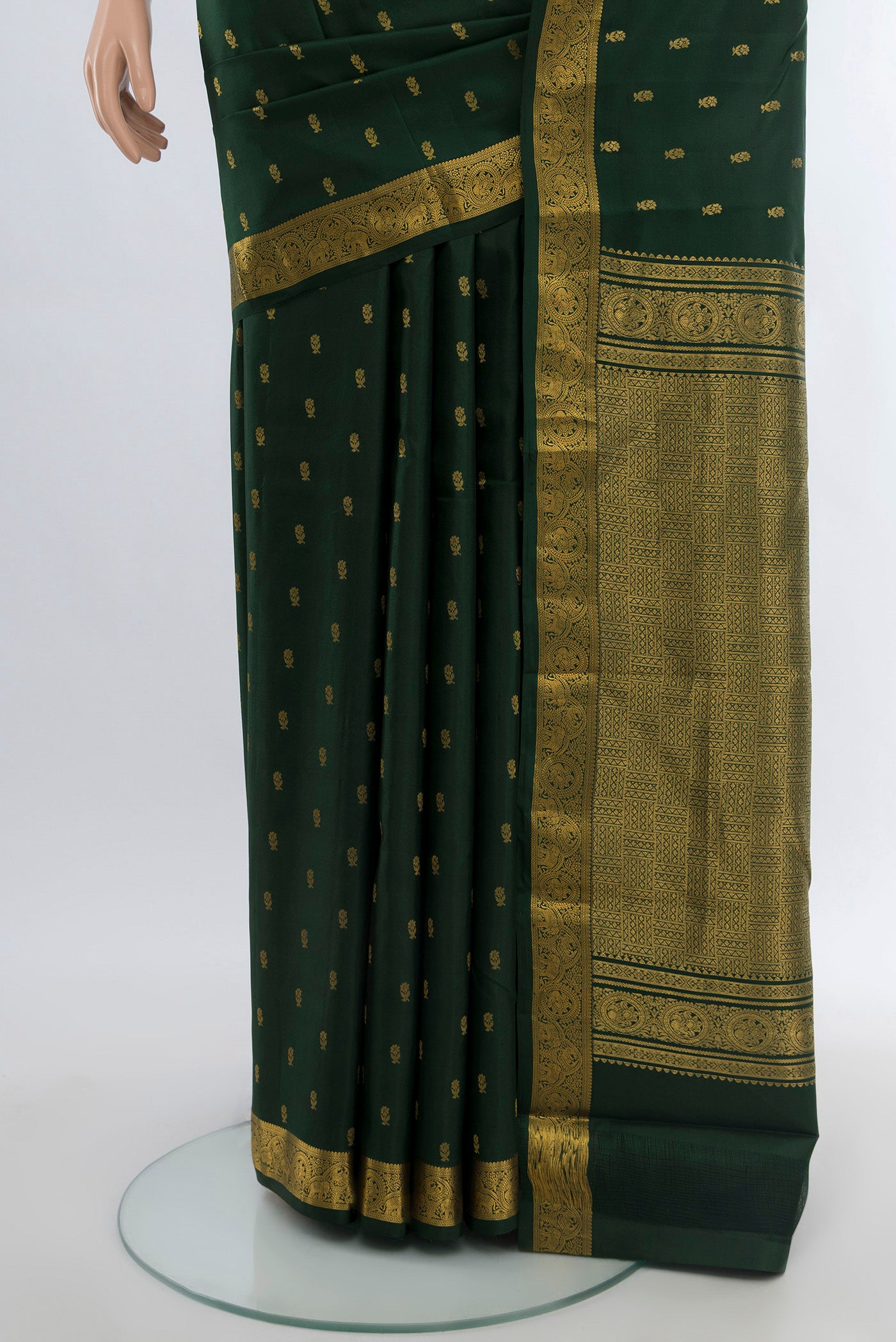 Pleats and pallu of Mint Green Kanchipuram Silk Saree with Zari Butta on the body and Silk Border. 