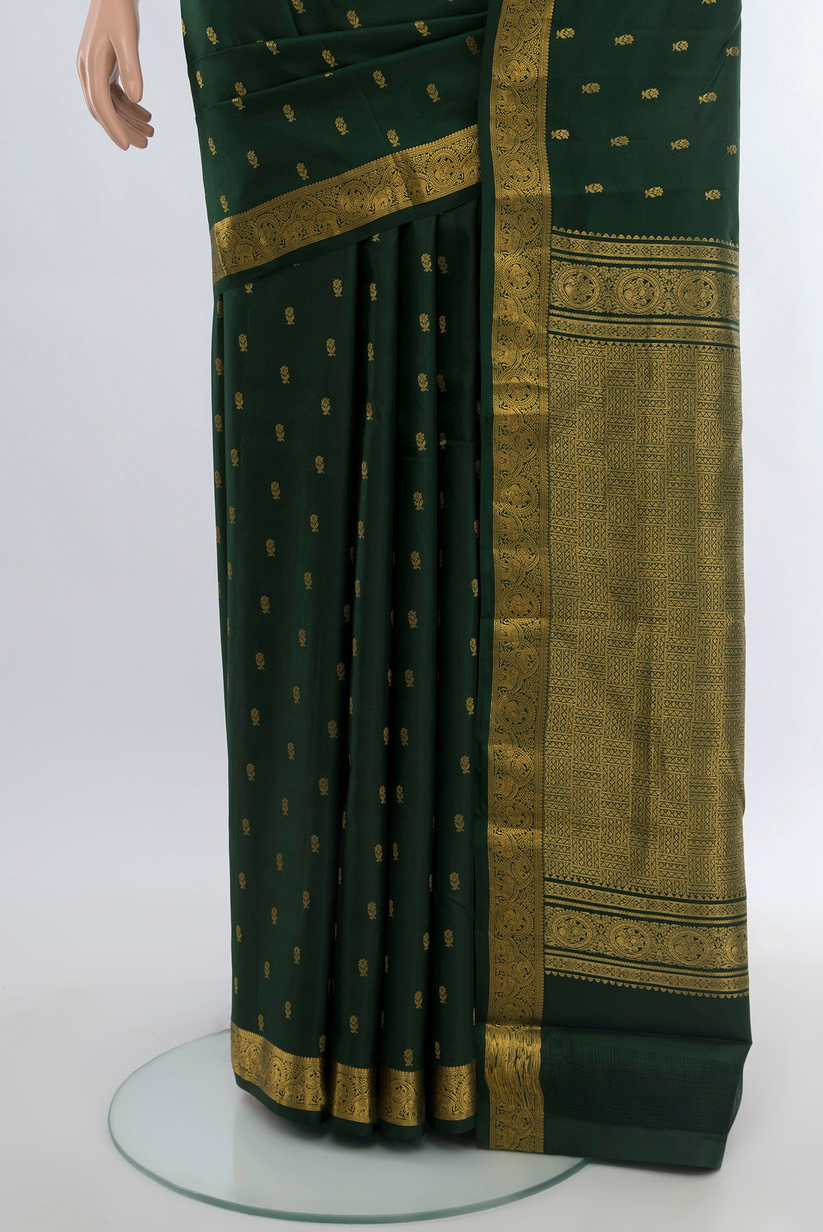 Pleats and pallu of Mint Green Kanchipuram Silk Saree with Zari Butta on the body and Silk Border. 