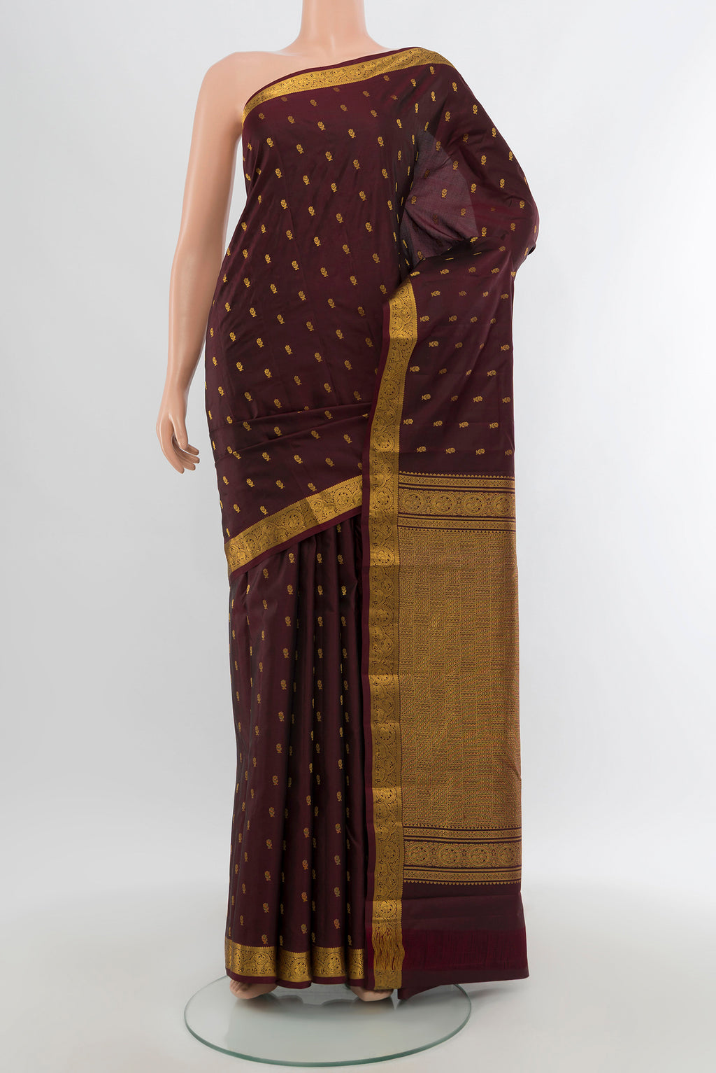 Coffee Brown Kanchipuram Silk Saree with Zari Butta on the body and Zari Border.  displayed on a mannequin