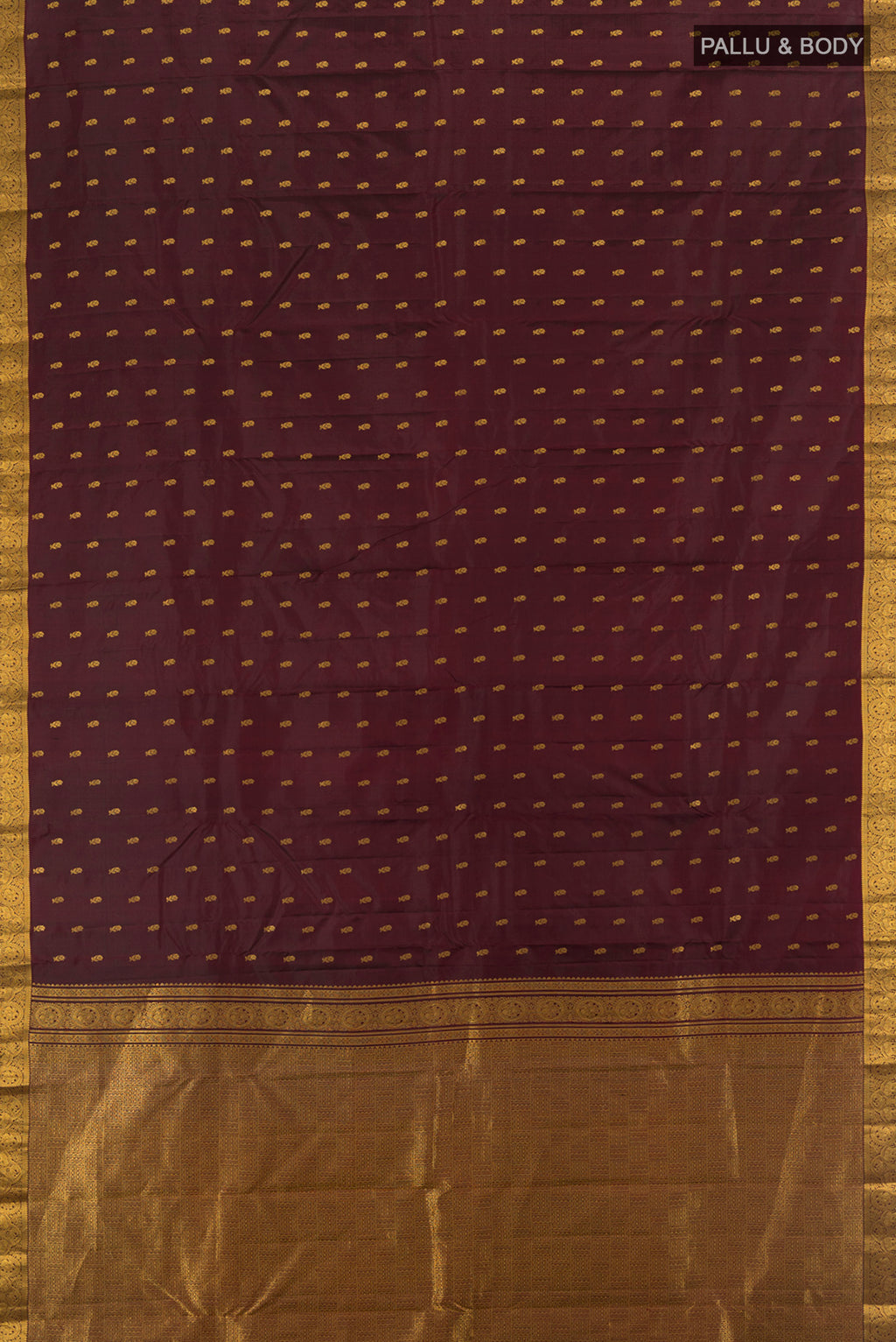 Flat view of Coffee Brown Kanchipuram Silk Saree with Zari Butta on the body and Zari Border. 