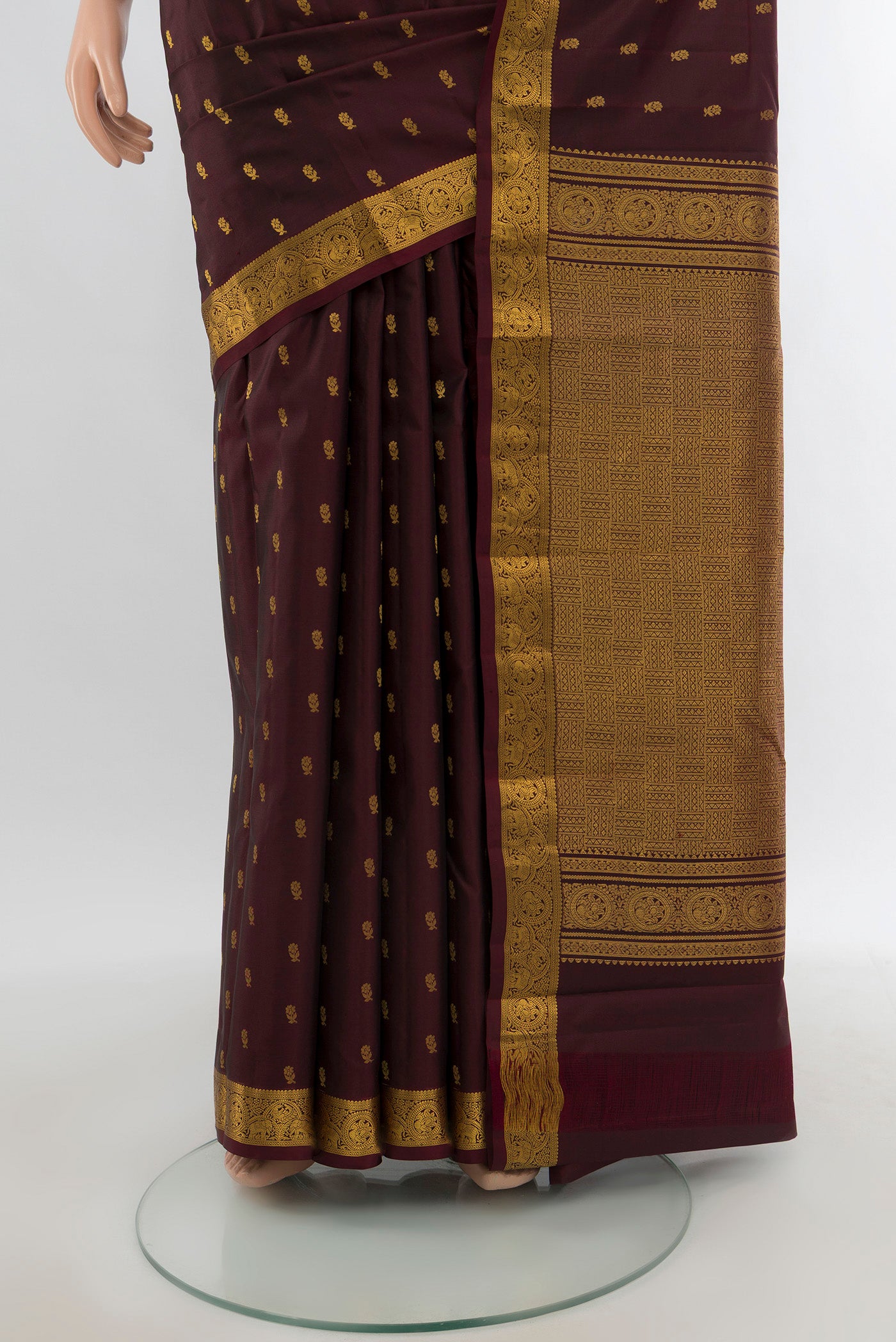 Pleats and pallu of Coffee Brown Kanchipuram Silk Saree with Zari Butta on the body and Zari Border. 