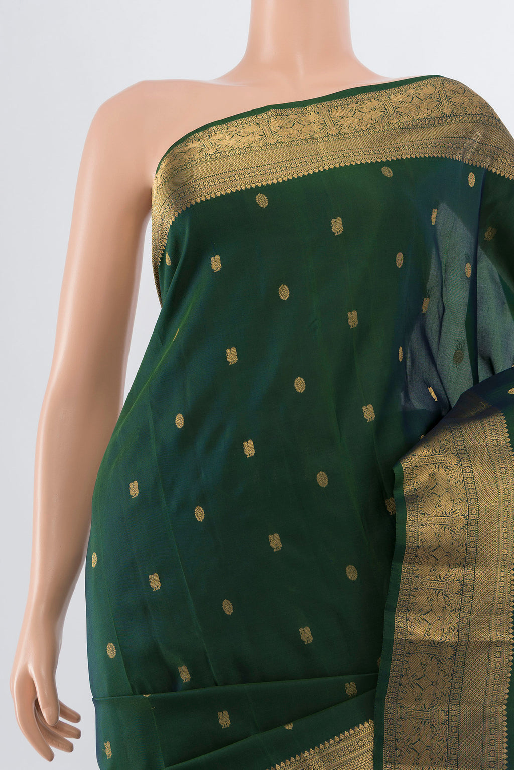 Border image of Pure Silk Pure Zari Bottle Green Kanchipuram Saree with Zari Butta on the body and Silk Border. 