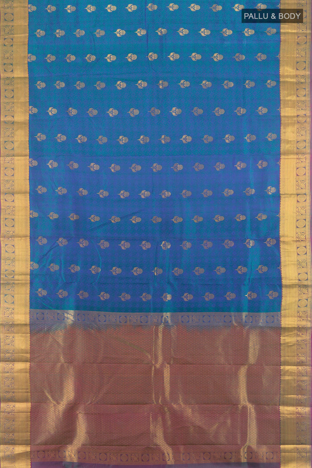 Flat view of Pure Silk Peacock Blue Kanchipuram Saree with Jacquard With Zari Butta on the body and Zari Border. 