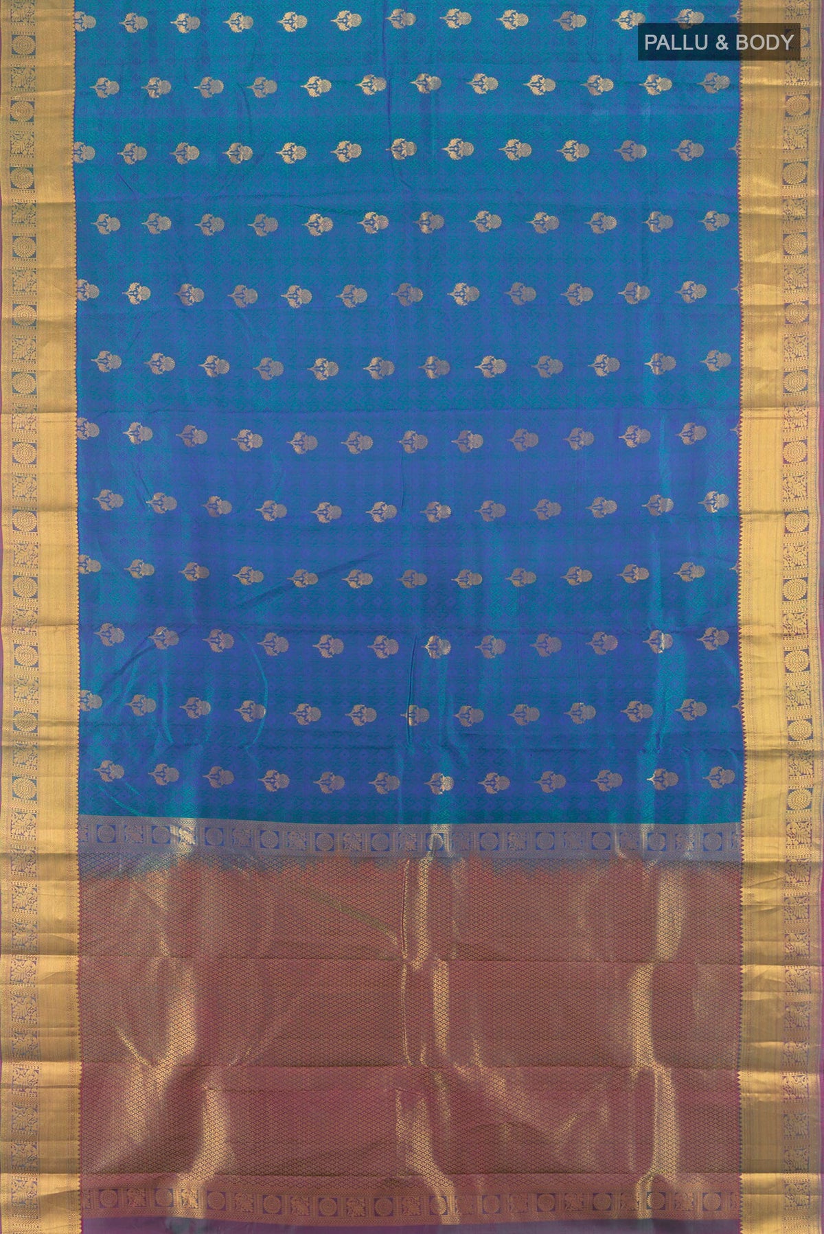 Flat view of Pure Silk Peacock Blue Kanchipuram Saree with Jacquard With Zari Butta on the body and Zari Border. 