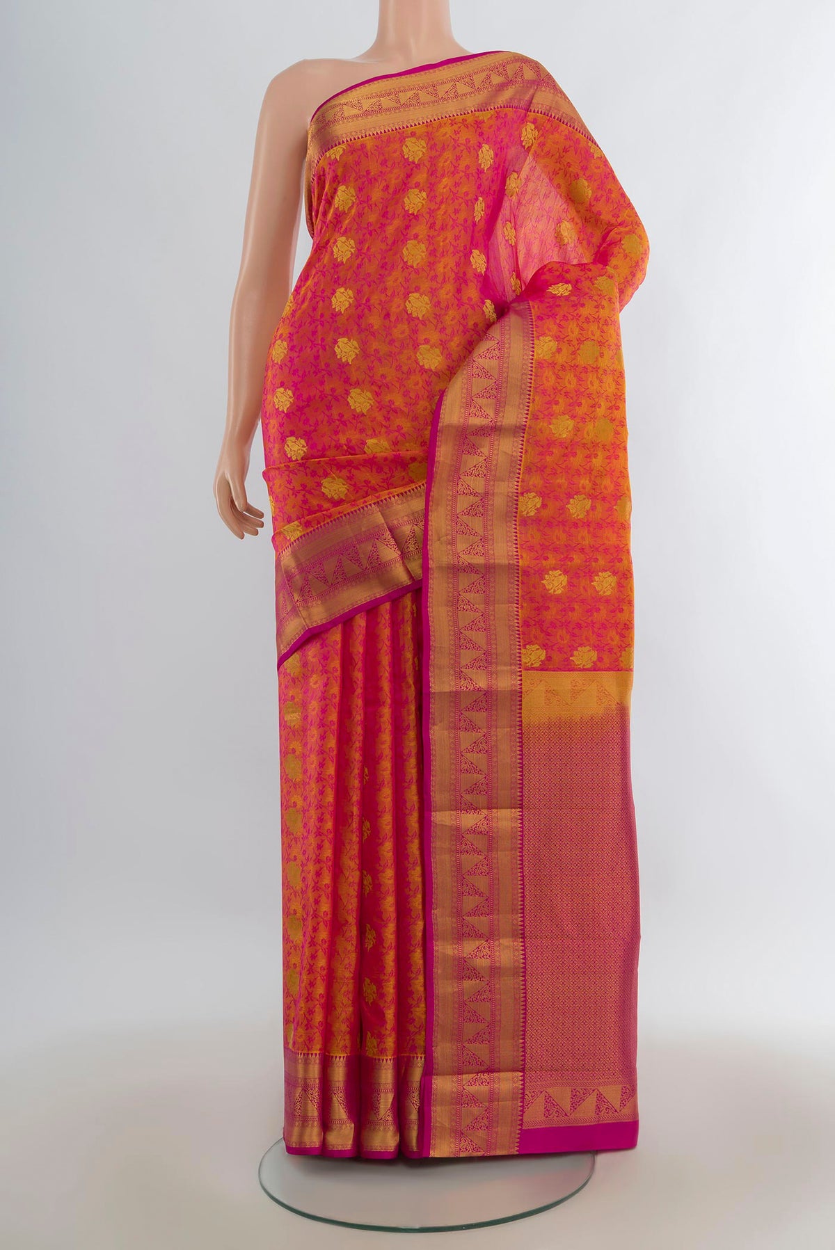 Pure Silk Pinkish Yellow Kanchipuram Saree with Jacquard With Zari Butta on the body and Zari Border.  displayed on a mannequin
