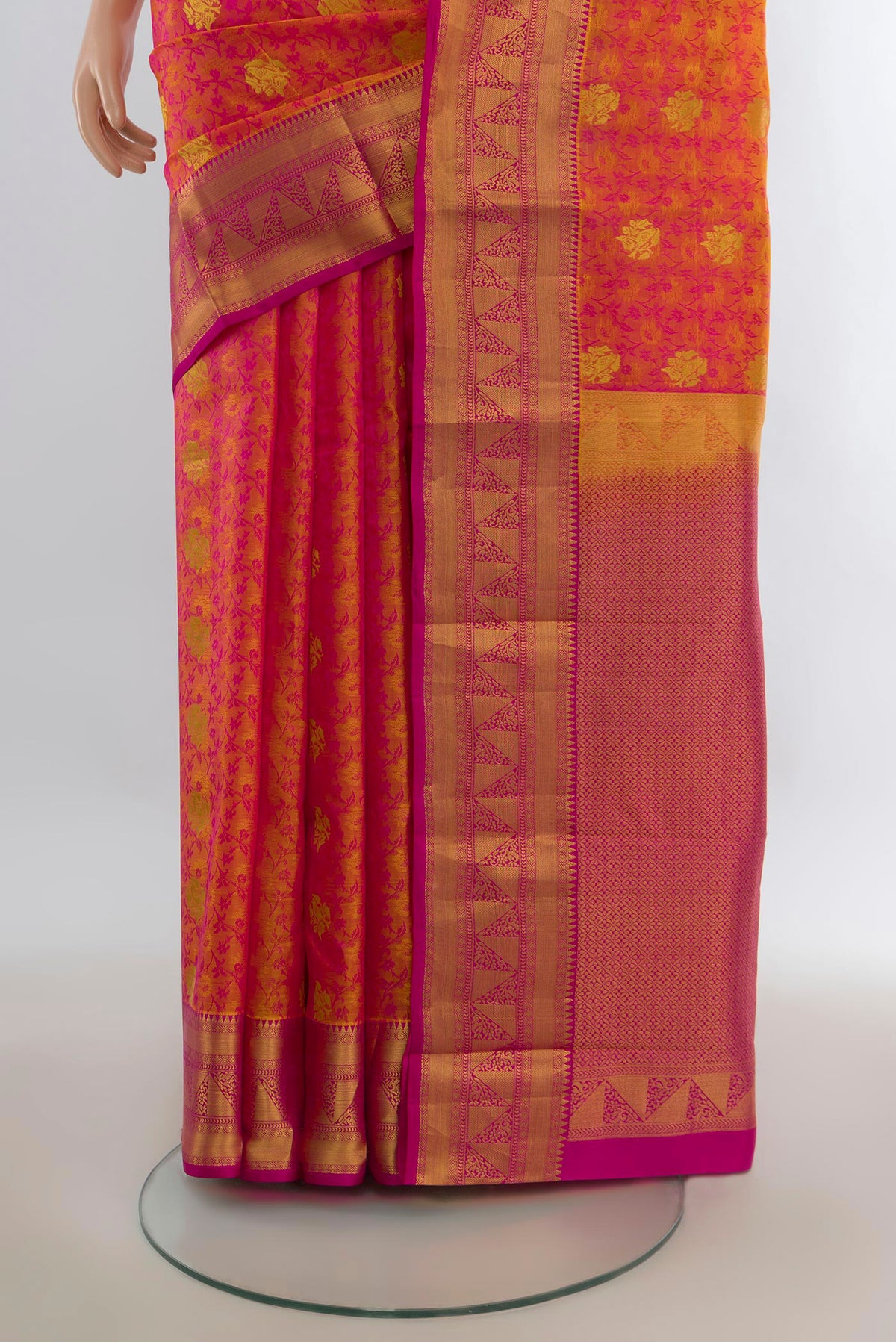 Pleats and pallu of Pure Silk Pinkish Yellow Kanchipuram Saree with Jacquard With Zari Butta on the body and Zari Border. 