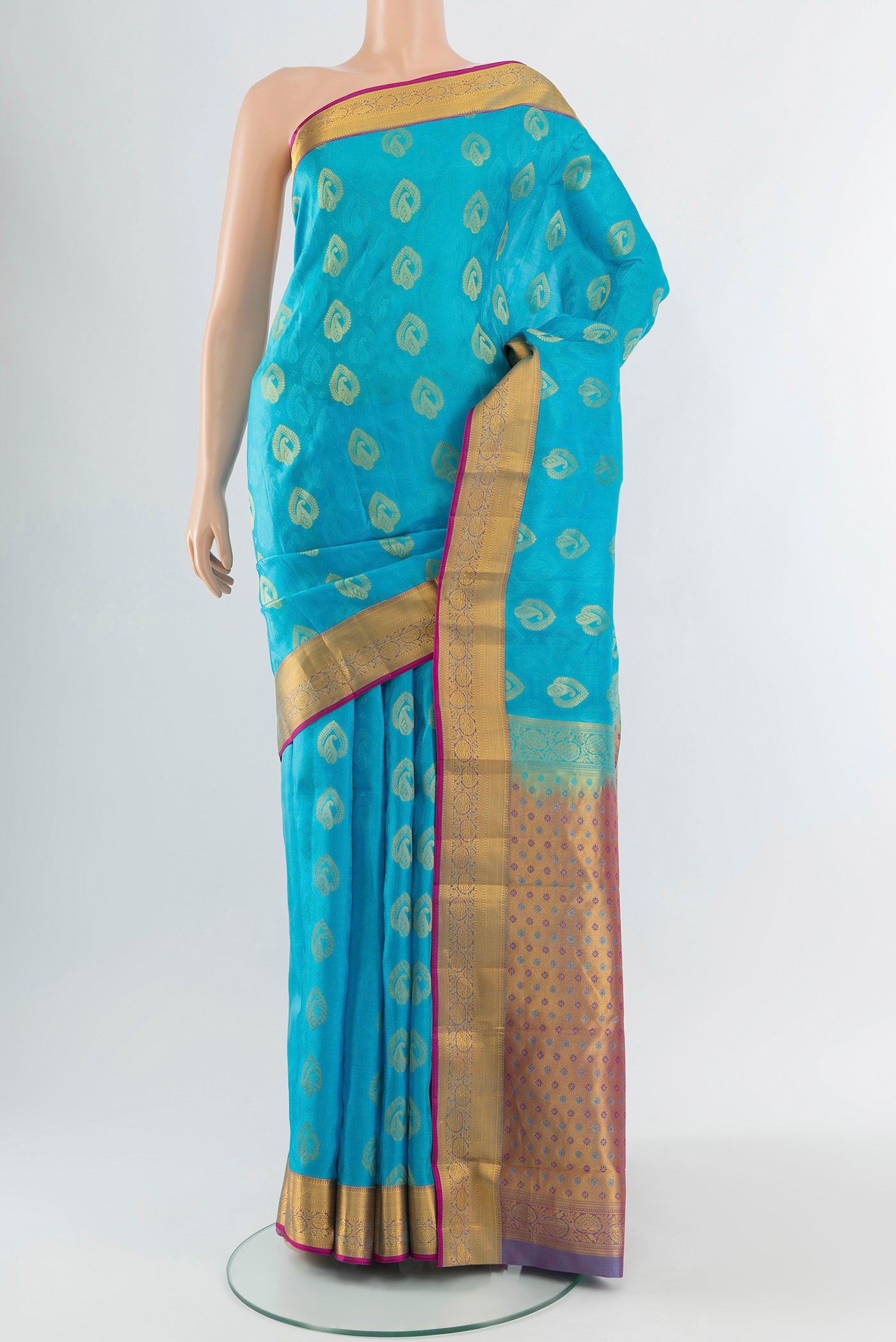Light Blue Kanchipuram Silk Saree with Jacquard With Zari Butta on the body and Zari Border.  displayed on a mannequin