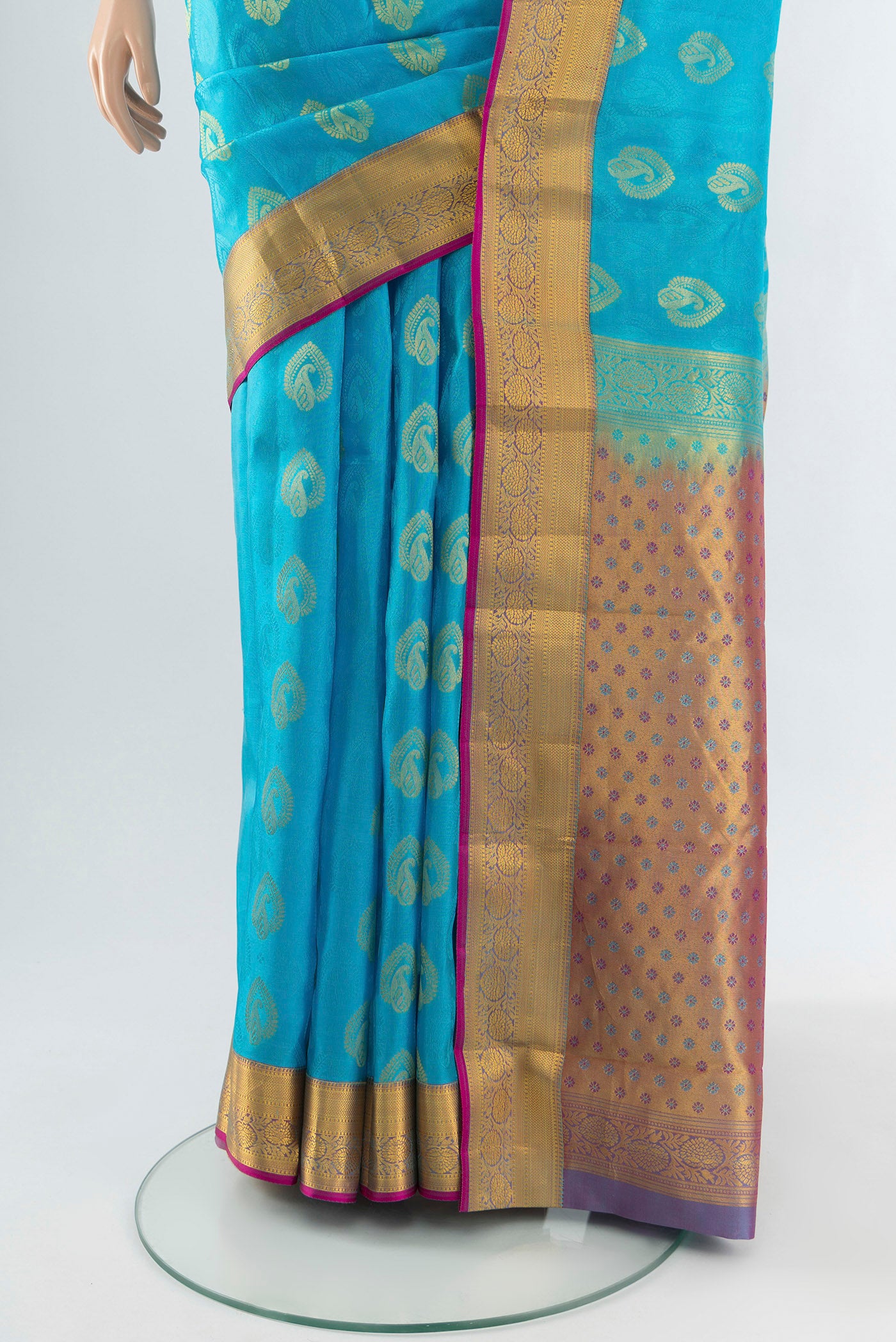 Pleats and pallu of Light Blue Kanchipuram Silk Saree with Jacquard With Zari Butta on the body and Zari Border. 