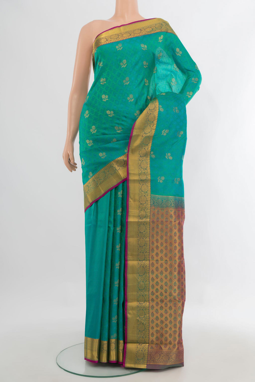 Pure Silk Turquoise Kanchipuram Saree with Jacquard With Zari Butta on the body and Zari Border.  displayed on a mannequin