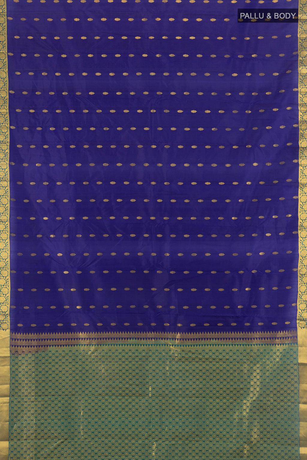 Flat view of Navy Blue Kanjivaram Silk Saree with Zari Butta on the body and Zari Border. 