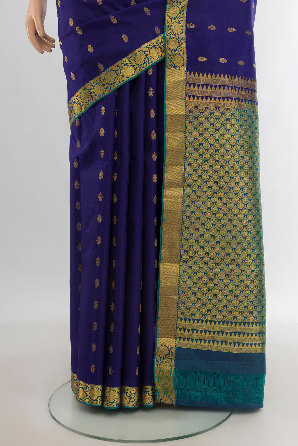Pleats and pallu of Navy Blue Kanjivaram Silk Saree with Zari Butta on the body and Zari Border. 