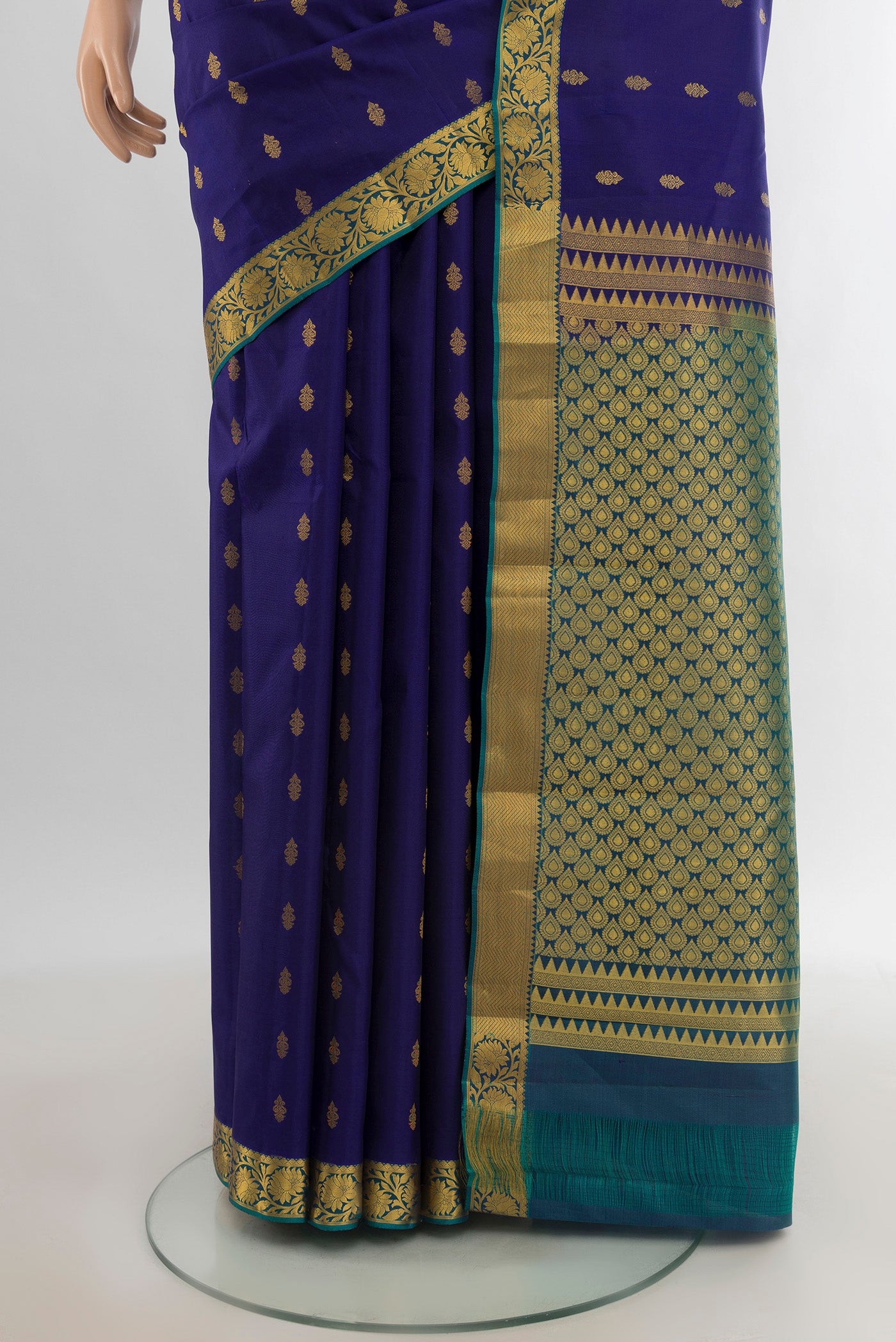 Pleats and pallu of Navy Blue Kanjivaram Silk Saree with Zari Butta on the body and Zari Border. 