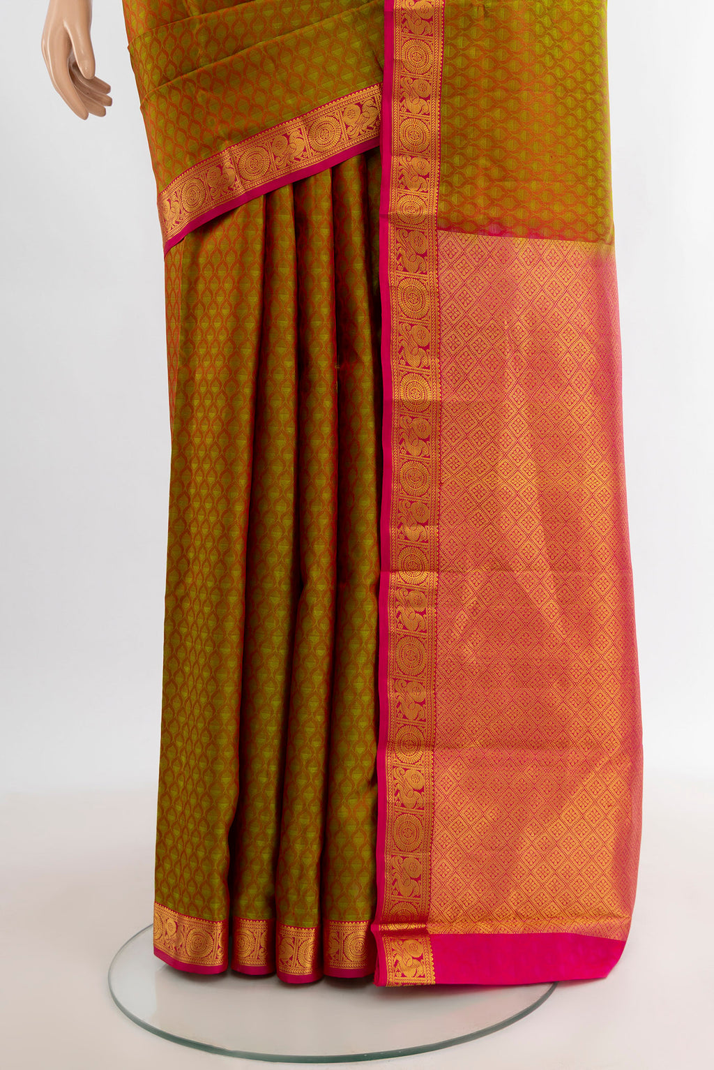 Pleats and pallu of Mehandi Green Kanjivaram Silk Saree with Jacquard design on the body and Zari Border. 