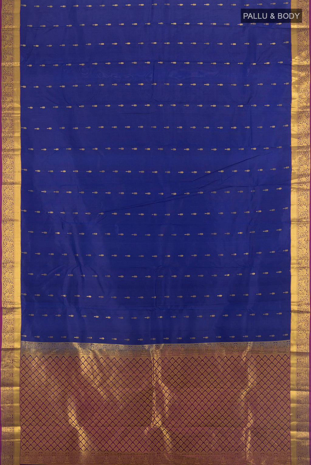 Flat view of Pure Silk Royal Blue Kanjivaram Saree with Zari Butta on the body and Zari Border. 