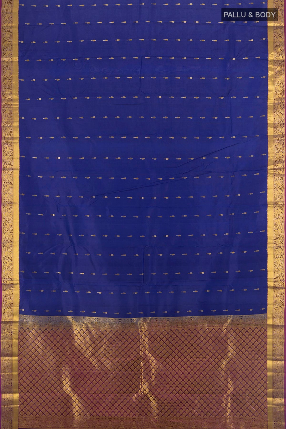 Flat view of Pure Silk Royal Blue Kanjivaram Saree with Zari Butta on the body and Zari Border. 