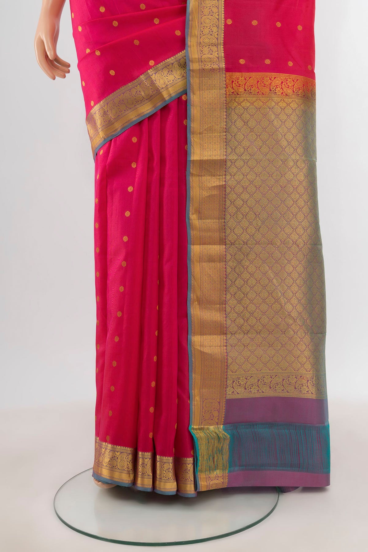 Pleats and pallu of Pink Kanjivaram Silk Saree with Zari Butta on the body and Zari Border. 