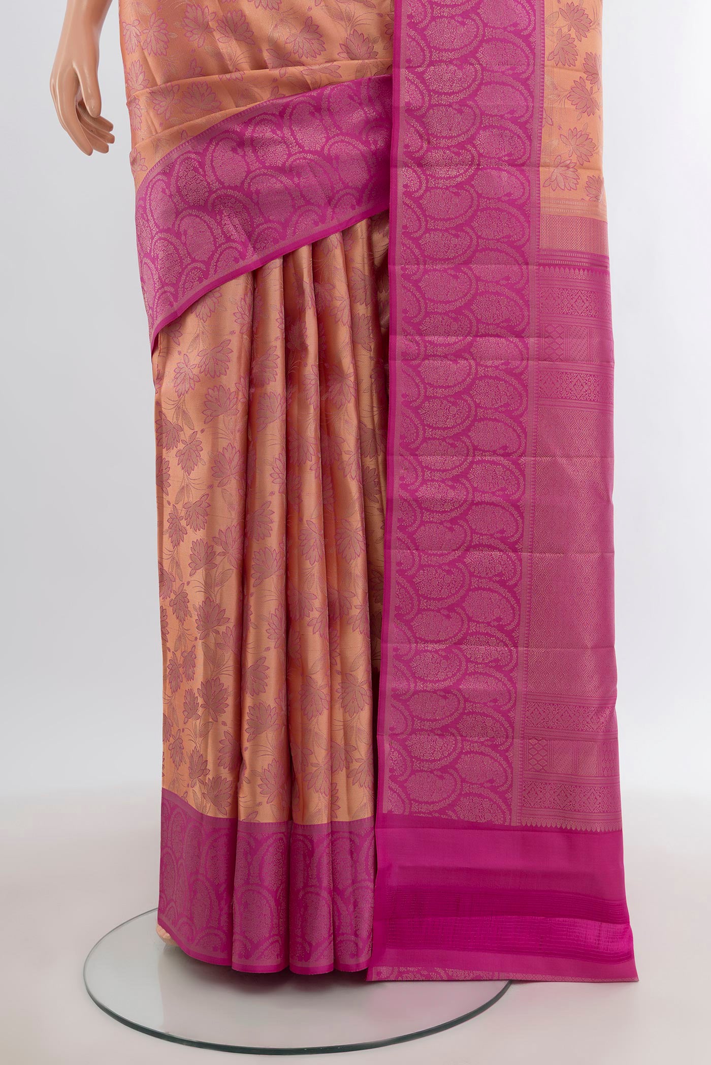 Pleats and pallu of Rose Gold Kanchipuram Silk Saree with Zari Brocade on the body and Zari Border. 