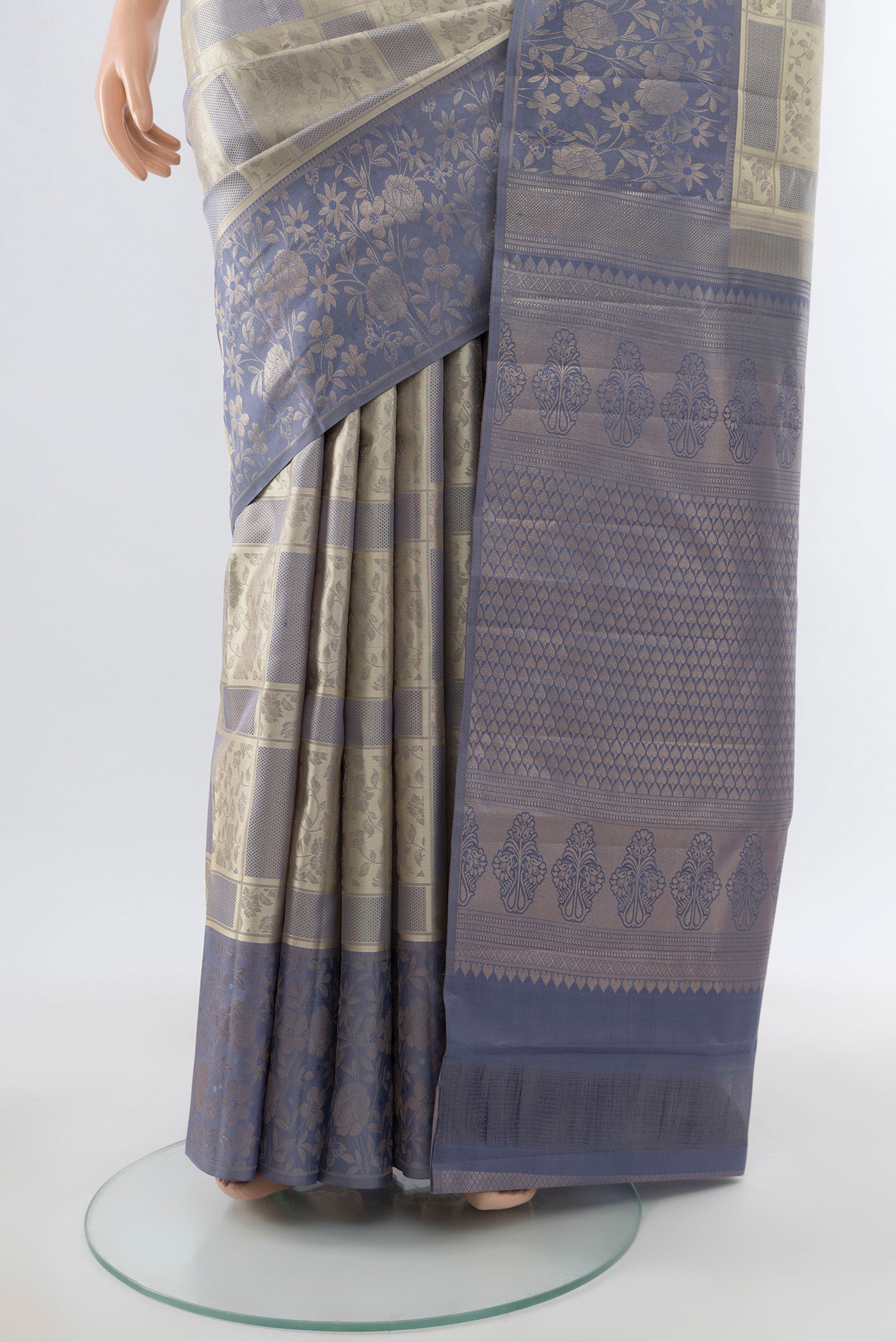 Pleats and pallu of Pure Silk Pure Zari Davys Grey Kanchipuram Saree with Zari Butta on the body and Silk Border. 