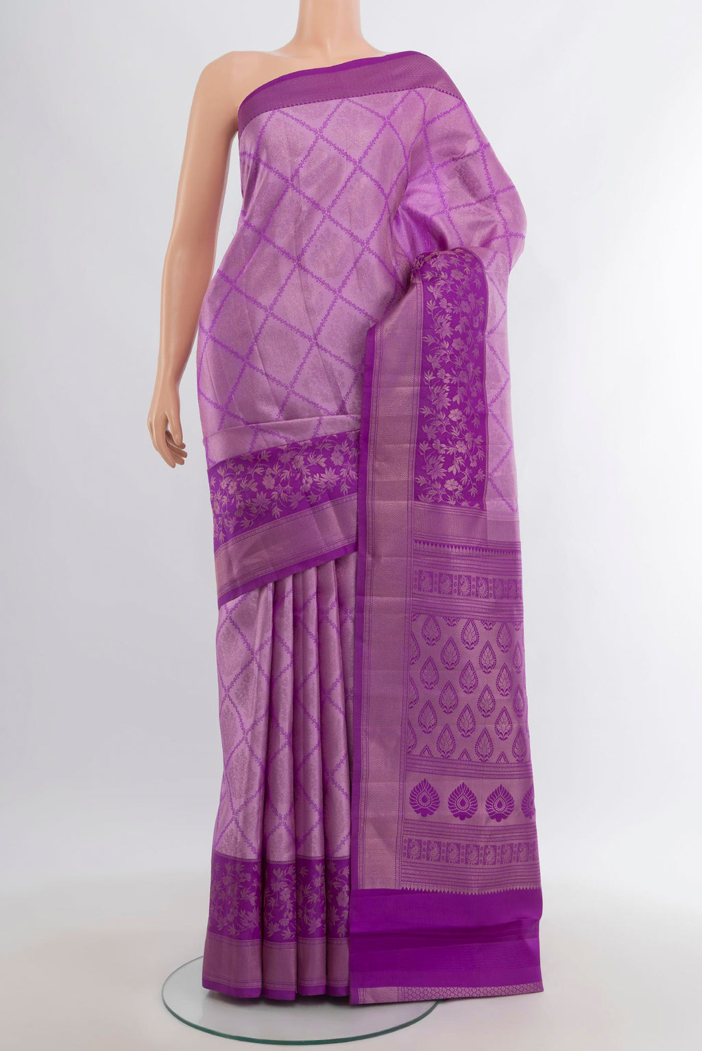 Violet Kanchipuram Silk Saree with Zari Brocade on the body and Zari Border.  displayed on a mannequin