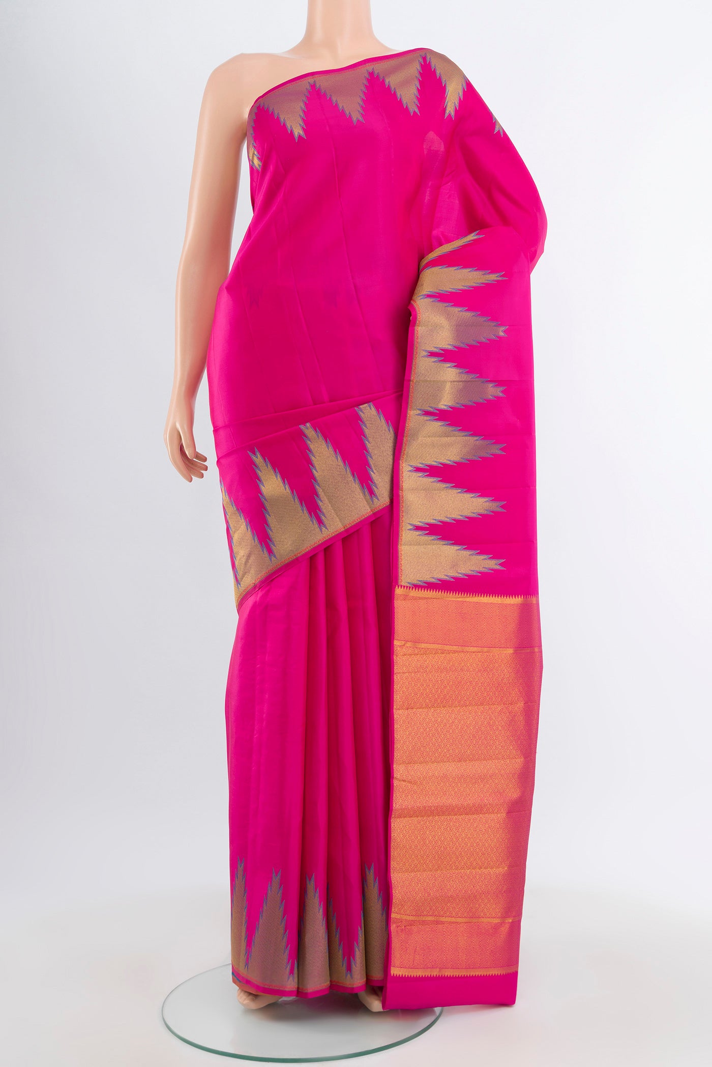 Pink Kanchipuram Silk Saree with Plain Body and Temple Border.  displayed on a mannequin