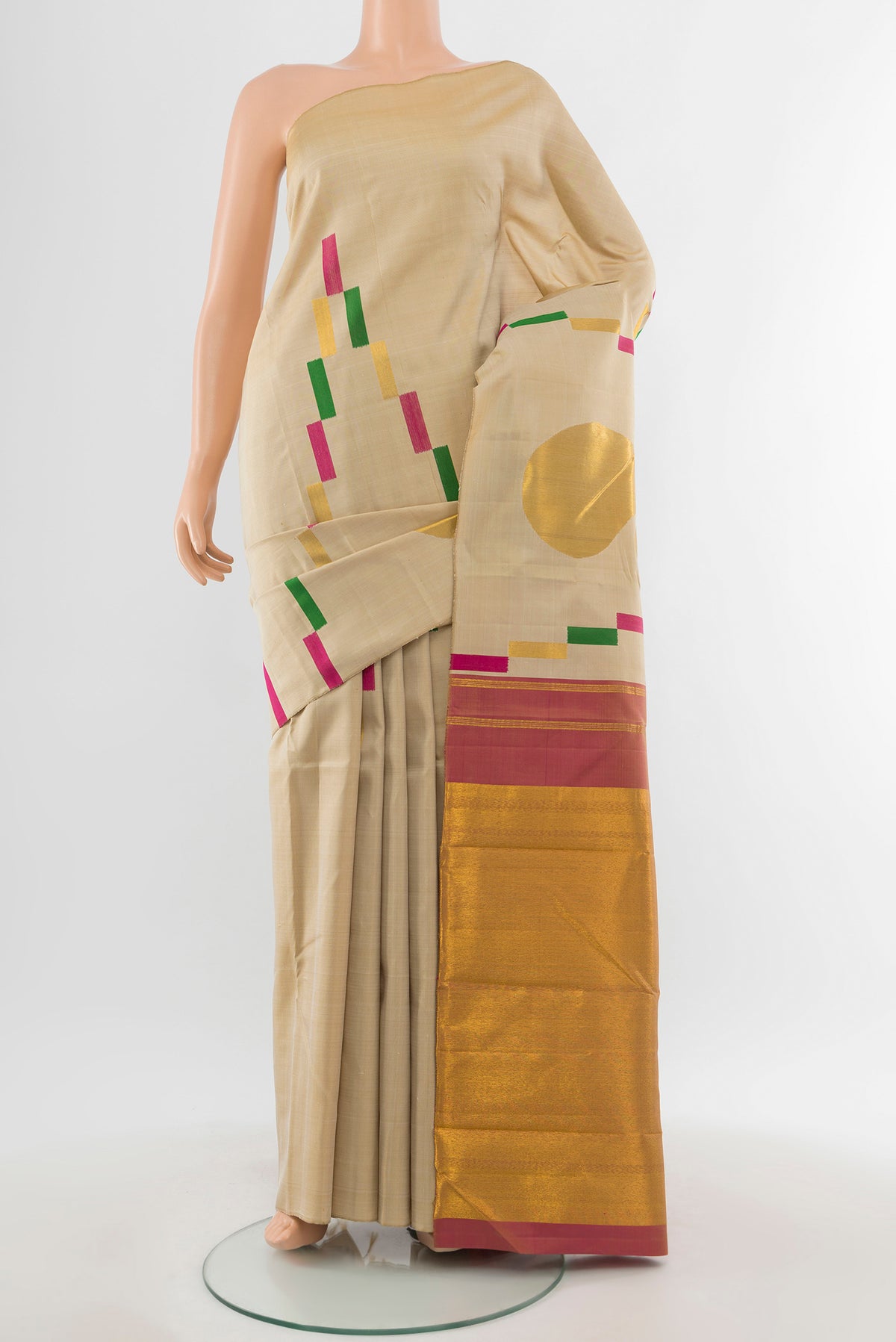 Pure Silk Pure Zari Beige Kanjivaram Saree with Zari Butta on the body and Silk Border.  displayed on a mannequin