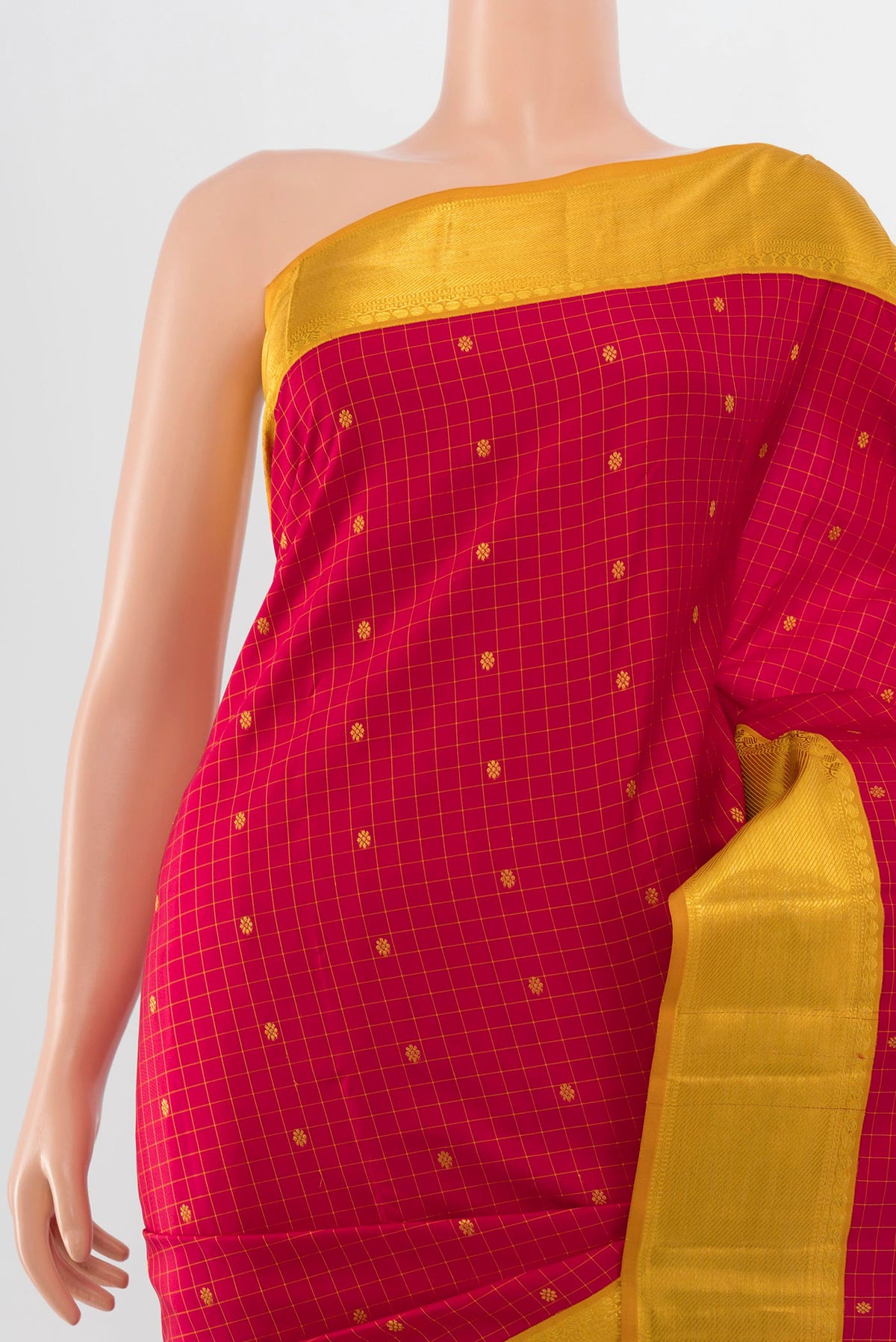 Border image of Maroon Kanjivaram Silk Saree with Zari Butta on the body and Silk Border. 