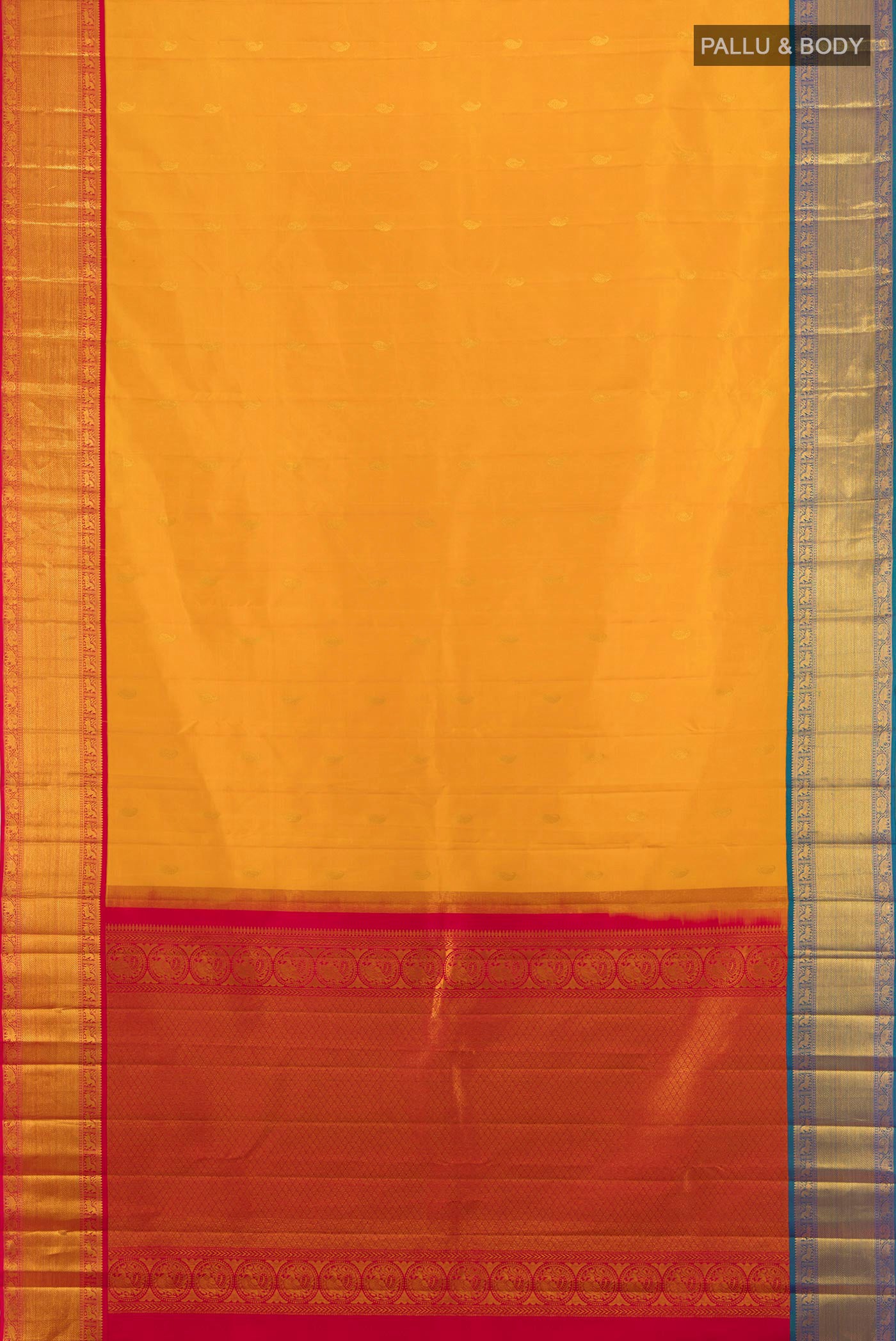 Flat view of Mustard Kanjivaram Silk Saree with Zari Butta on the body and Ganga Jamuna Border. 