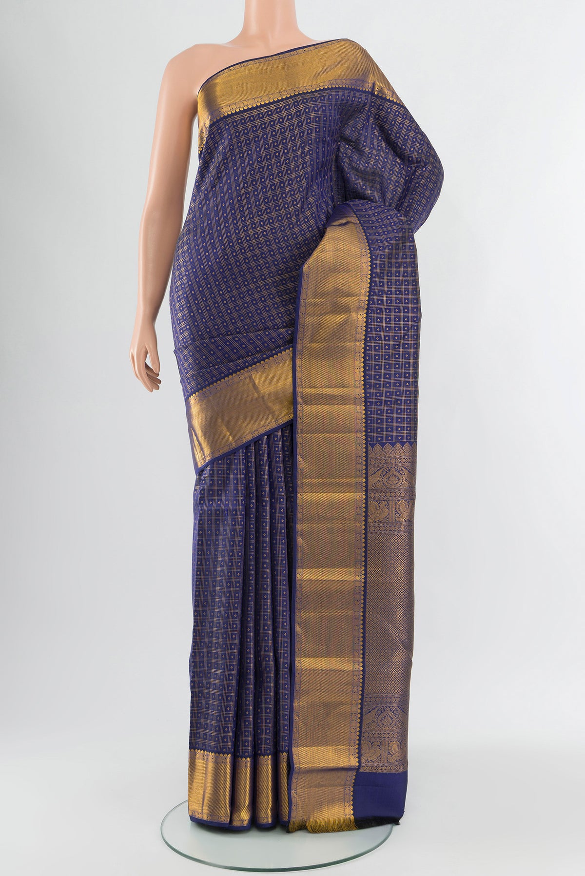 Dark Blue Kanjivaram Silk Saree with Checked design on the body and Zari Border.  displayed on a mannequin
