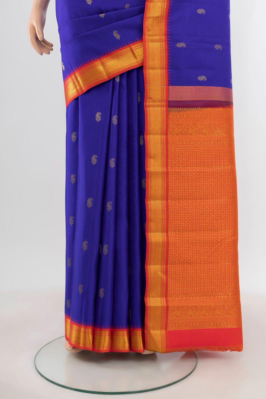 Pleats and pallu of Royal Blue Kanchipuram Silk Saree with Zari Butta on the body and Zari Border. 