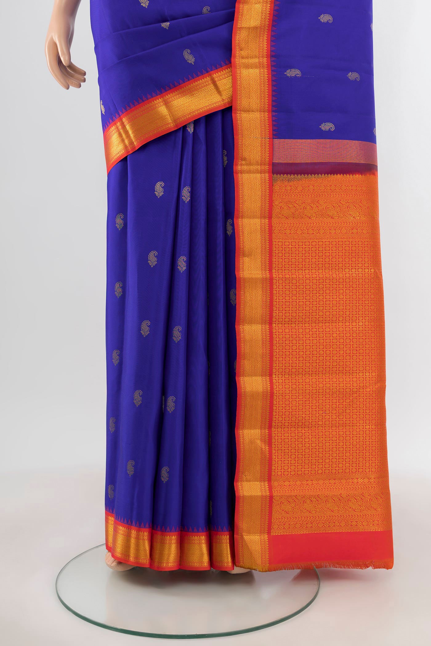 Pleats and pallu of Royal Blue Kanchipuram Silk Saree with Zari Butta on the body and Zari Border. 
