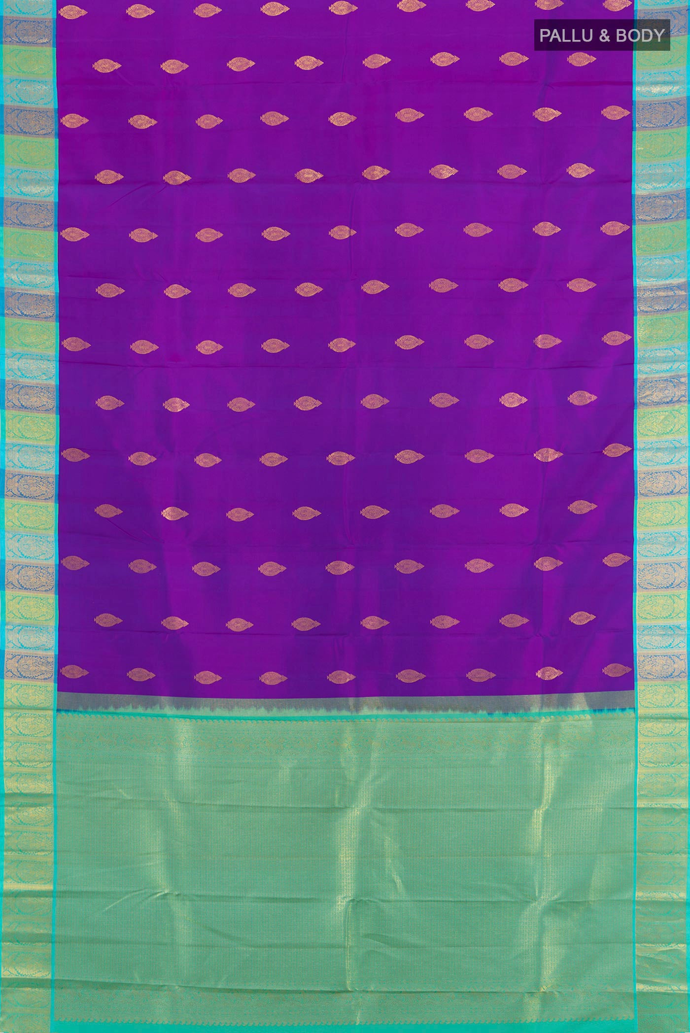 Flat view of Purple Kanchipuram Silk Saree with Zari Butta on the body and Zari Border. 