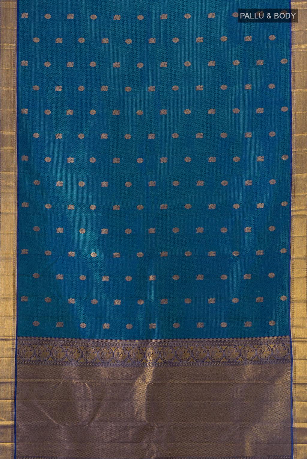 Flat view of Pure Silk Pure Zari Dark Blue Kanchipuram Saree with Zari Butta on the body and Silk Border. 