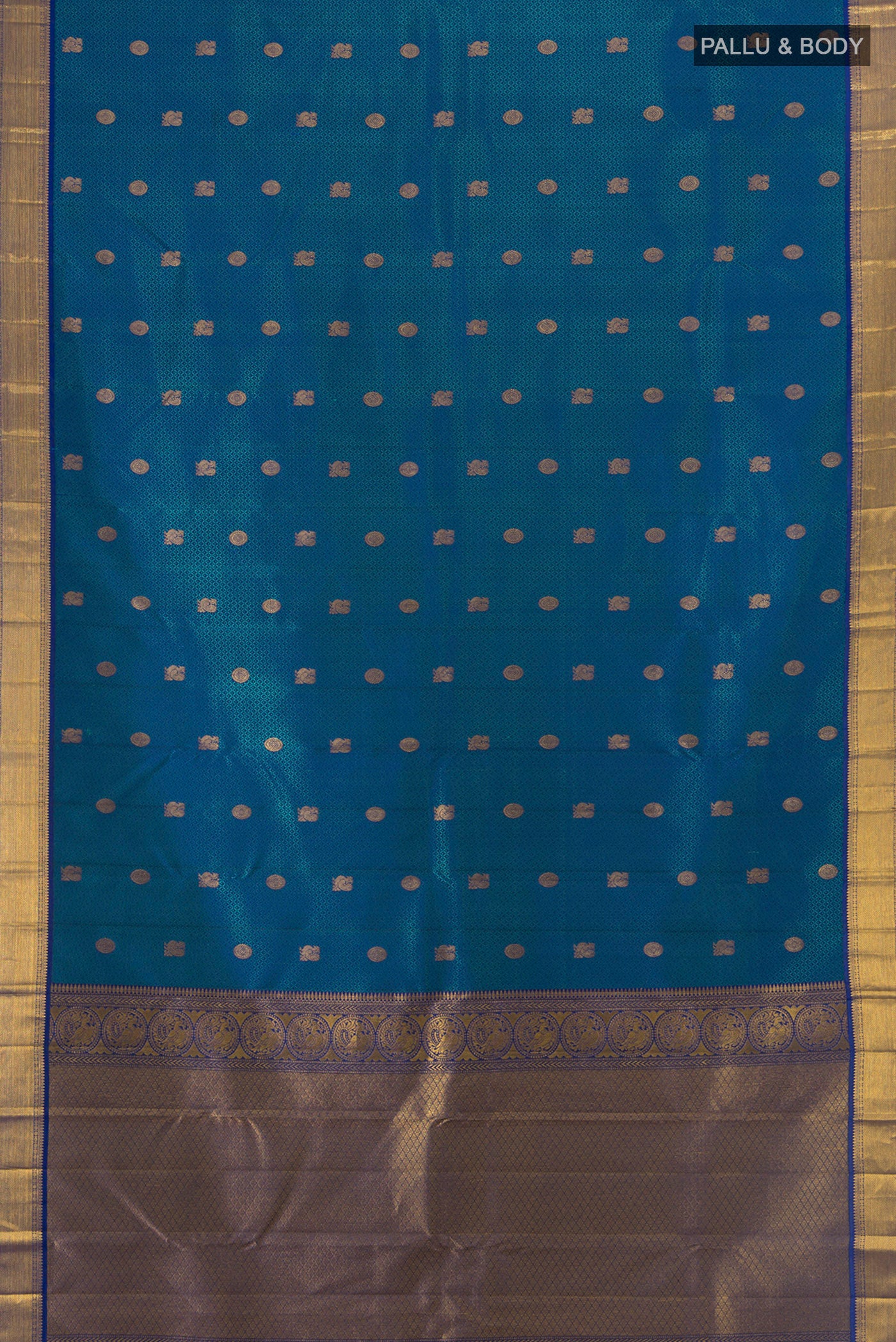 Flat view of Pure Silk Pure Zari Dark Blue Kanchipuram Saree with Zari Butta on the body and Silk Border. 